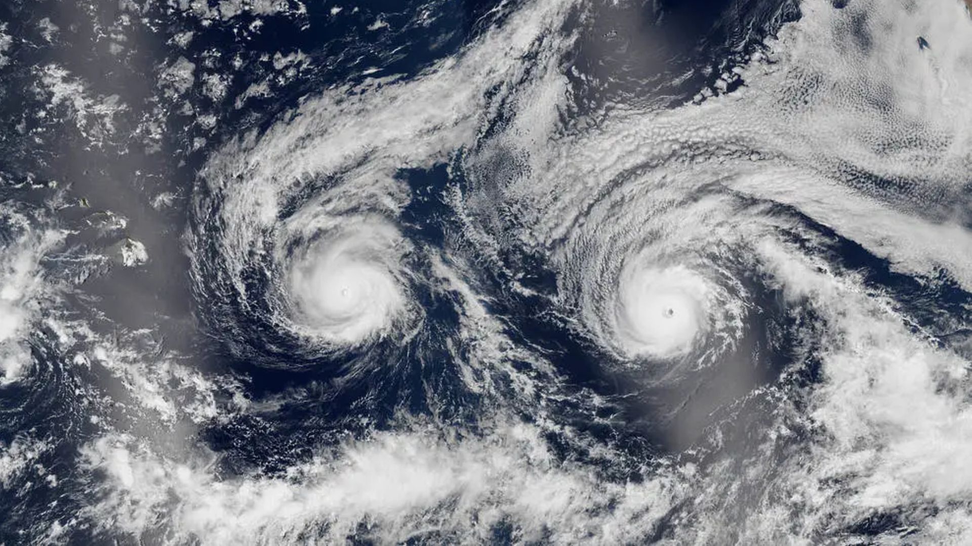 Twin hurricanes stare out to space as they barrel toward Hawaii — Earth from space Twin hurricanes stare out to space as they barrel toward Hawaii — Earth from space
